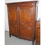 AN 18TH CENTURY FRENCH WALNUT ARMOIRE,