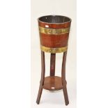 AN OAK AND ELM BRASS BOUND JARDINIERE,