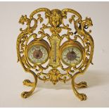 AN UNUSUAL ORMOLU TABLE TOP BAROMETER CL