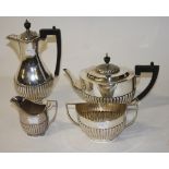 A FOUR PIECE MATCHED TEA AND COFFEE SERVICE, Comprising a half reeded oval tea pot, London 1890; a