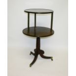 A MAHOGANY CIRCULAR TWO-TIER DUMBWAITER,