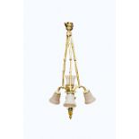 AN ATTRACTIVE CAST BRASS THREE BRANCH FOUR LIGHT CEILING LIGHT, with frosted glass shades and leaf