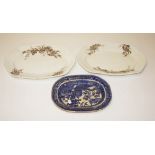 A PAIR OF RECTANGULAR SERPENTINE SHAPED BROWN AND WHITE MEAT PLATTERS, 18in (46cm), and another