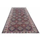 A LARGE HAMADAN RUG,