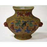 AN UNUSUAL CHINESE RELIEF MOULDED WALL MOUNTED BALUSTER SHAPED VASE, with temple lions in relief and