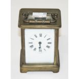 A FIVE GLASS BRASS CARRIAGE CLOCK, distributed by John Wanamaker New York, with French movement
