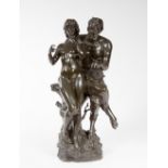 AFTER CLODION (LATE 19TH CENTURY), a bronze group modelled as Pan Seated on a Tree Stump, Holding