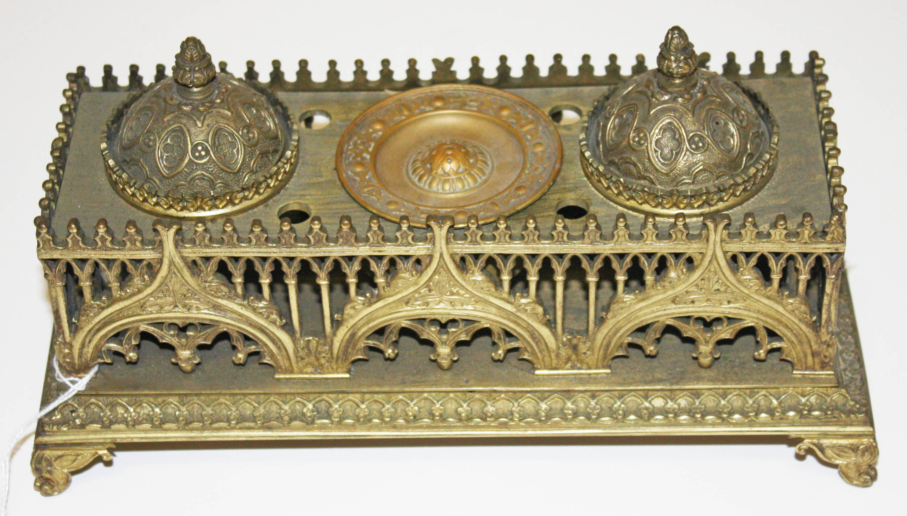 A VERY ATTRACTIVE 19TH CENTURY BRASS DESK STAND, in the Gothic style, with typical pierced tracery
