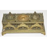 A VERY ATTRACTIVE 19TH CENTURY BRASS DESK STAND, in the Gothic style, with typical pierced tracery