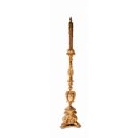 A TALL CARVED AND LEAF MOULDED LAMP, on paw feet, 39in (99cm)h. (1)