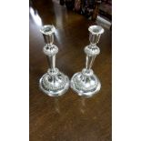 A PAIR OF SHEFFIELD PLATED TALL CANDLESTICKS, 11.5in (30cm).