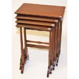 A NEST OF FOUR MAHOGANY QUARTETTO TABLES