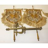 A PAIR OF 19TH CENTURY GILT BRASS BANNER HEAT SCREENS, each with pearl and bead tapestry panel,