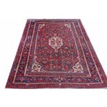 A NORTH WEST PERSIAN HAND MADE RUG,