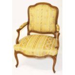 A LOUIS XV STYLE FRENCH WALNUT ARMCHAIR,