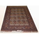 AN ORIENTAL RUG,