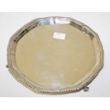 A GEORGE III STYLE SILVER SALVER OR WAIT