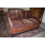 A 17TH CENTURY STYLE THREE SEATER SETTEE