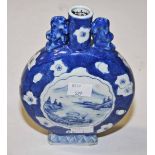 A CHINESE BLUE AND WHITE PORCELAIN MOON