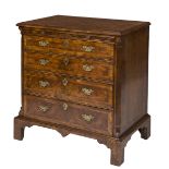 A FINE WALNUT AND CROSS BANDED CHEST,