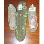 AN UNUSUAL PAIR OF INDIAN HAND MADE AND EMBROIDERED LEATHER CHILDS SLIPPERS, With rows of