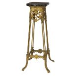 AN UNUSUAL GILT BRASS PEDESTAL, with speckled green marble top, raised on four double tubular reeded