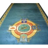 "THE NEW IRELAND CARPET"
A VERY LARGE IRISH ROYAL BLUE GROUND DONEGAL CARPET
the central medallion