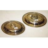 THREE SIMILAR OVAL SILVER PLATED ENTREE DISHES, COVERS AND HANDLES,