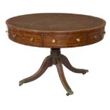 A CIRCULAR REGENCY PERIOD LIBRARY DRUM TABLE with circular green tooled leather top above four