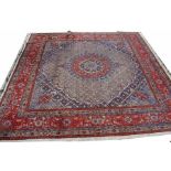 A MOUD RUG, 
the floral field with a central medallion, in conforming spandrels,