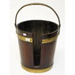 AN IRISH GEORGIAN PERIOD MAHOGANY AND BRASS BOUND PLATE BUCKET, 
with brass carrying handle,