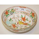 A 19TH CENTURY CHINESE PORCELAIN BOWL, 
decorated with flowers and bird, 8.