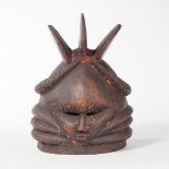 A SANDE SOCIETY HELMET MASK,
Mende, Sierra Leone / Liberia,