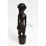 A RHYTHM POUNDER FIGURE, Senufo, Ivory Coast, Deble, good patina, 67 x 15cm.