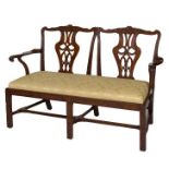 A GEORGE III PERIOD MAHOGANY DOUBLE CHAIR BACK SETTEE,