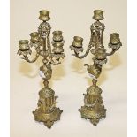 A PAIR OF BRASS FOUR BRANCH FIVE LIGHT CANDELABRA, 
early 20th century,