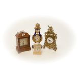 A BLUE PORCELAIN AND GILT METAL MOUNTED LYRE MANTLE CLOCK,