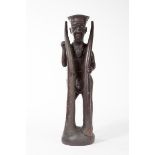 AN ALTAR MEMORIAL FIGURE, Luba, DRC, modelled as a renowned hunter with elephant tusks,