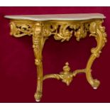 A VERY ATTRACTIVE 19TH CENTURY SERPENTINE SHAPED CARVED GILTWOOD CONSOLE TABLE,