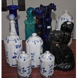 A SET OF FIVE GERMAN BLUE AND WHITE KITCHEN JARS AND COVERS, 
the tallest 11.