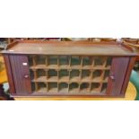 A VICTORIAN MAHOGANY TABLE TOP ESTATE OR STATIONARY CABINET, 
with two front tambour doors,