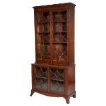 A FINE REGENCY PERIOD EBONY STRUNG AND CROSS BANDED MAHOGANY BOOKCASE,