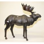 A BRONZED LEATHER BOUND MODEL OF A MOOSE, 
with glass eyes, in standing position , 35.5in (0cm)h.