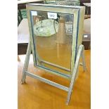 A SMALL UNUSUAL SWING FRAME DOUBLE SIDED DRESSING TABLE MIRROR, 
with cased compartment,