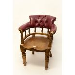 A LATE 19TH CENTURY DESK CHAIR, 
with padded back and elbow rests,