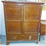 A SMALL OAK WARDROBE, late 19th century in the 18th century style,