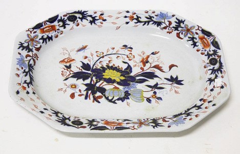 A heavy ironstone meat platter, 19th century, in the Imari style with flower decoration,