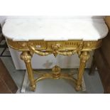 A LOUIS XV STYLE FRENCH GILT CONSOLE TABLE, 
with shaped marble top,