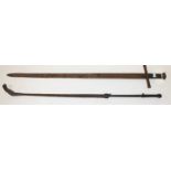 A LEATHER BOUND RIDING CROP, 
With interlaced leather grip and a concealed spike sword,