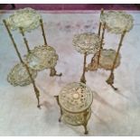 A PAIR OF THREE TIER MODERN BRASS PLANT STANDS, 
and a smaller two tier similar ditto.